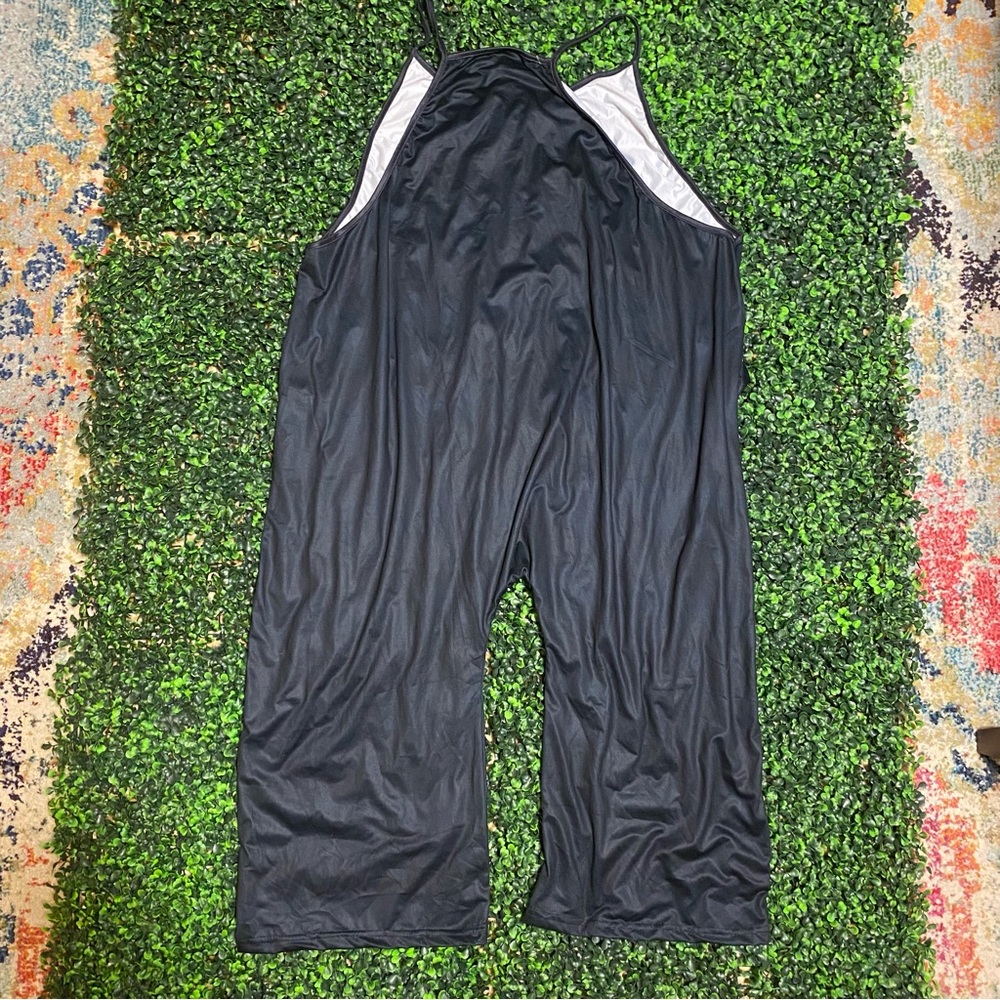 Never Been Worn Black One Piece Jumper. Size XL.